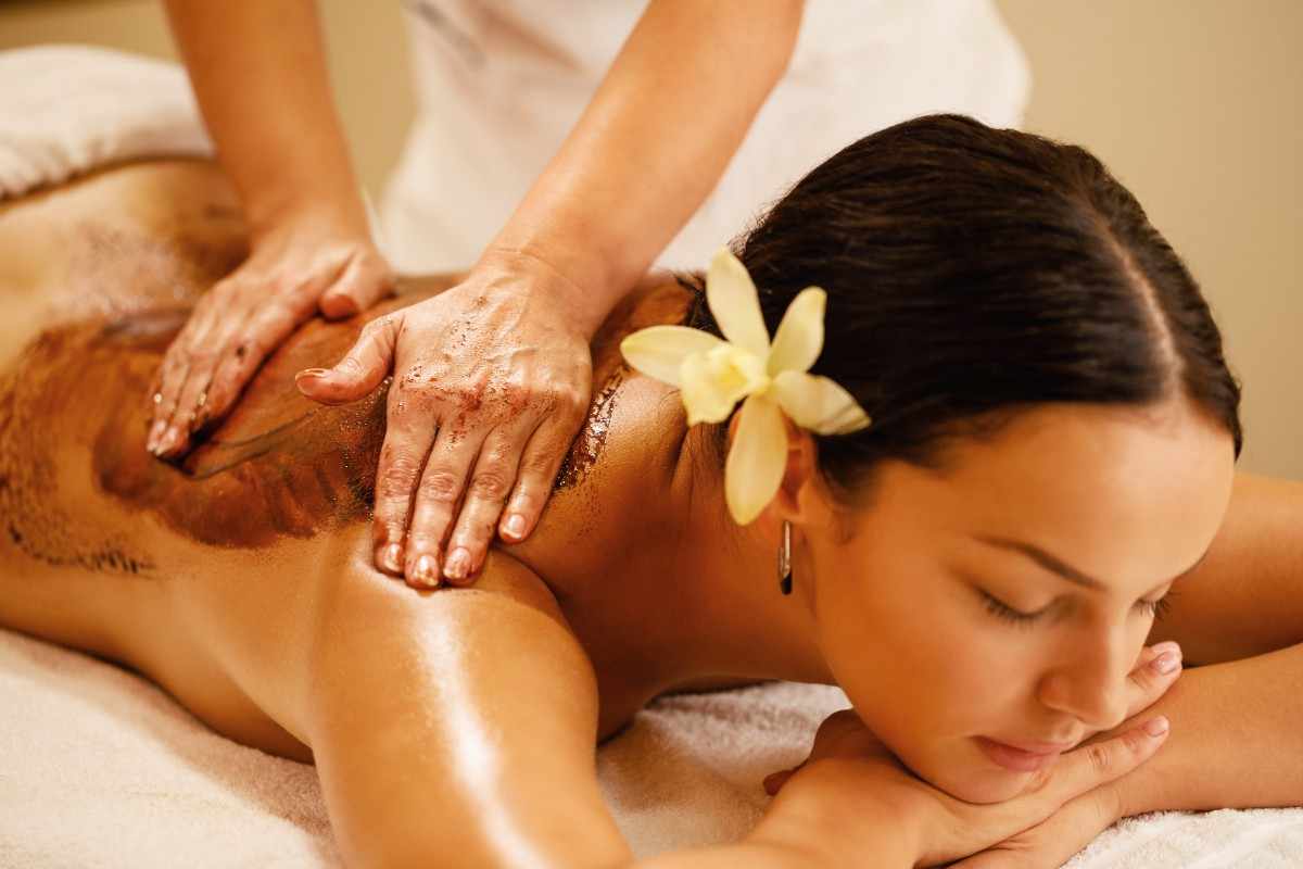 Happy client after massage session at spa near Marol